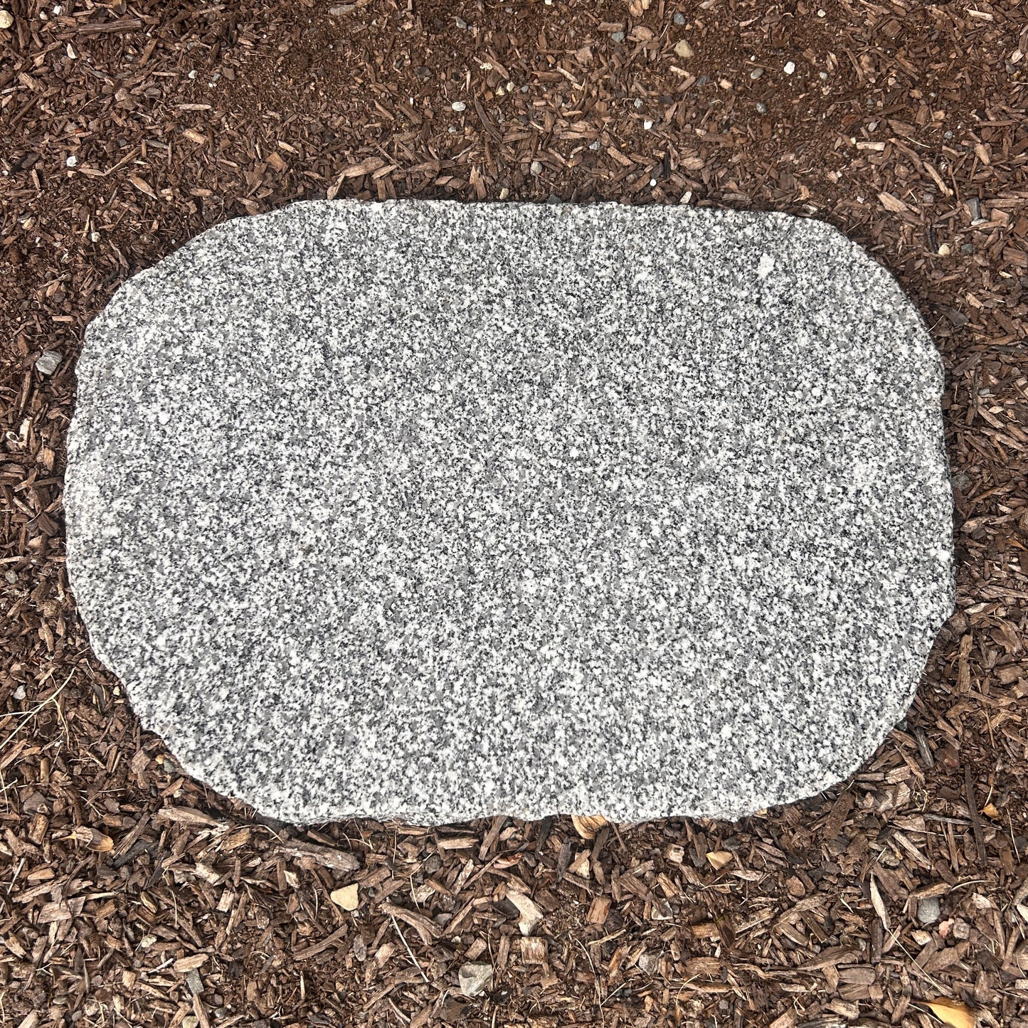 White Granite Stepper on Mulch